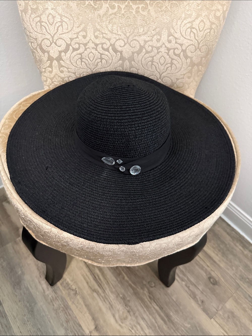 Elegant Black Wide-Brim Straw Sun Hat with Gem Accent